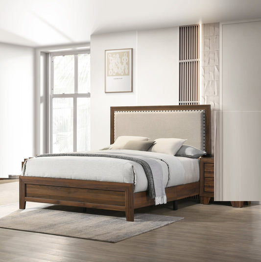 King panel bed with brown cherry finish, upholstered headboard, and tufted nailhead trim